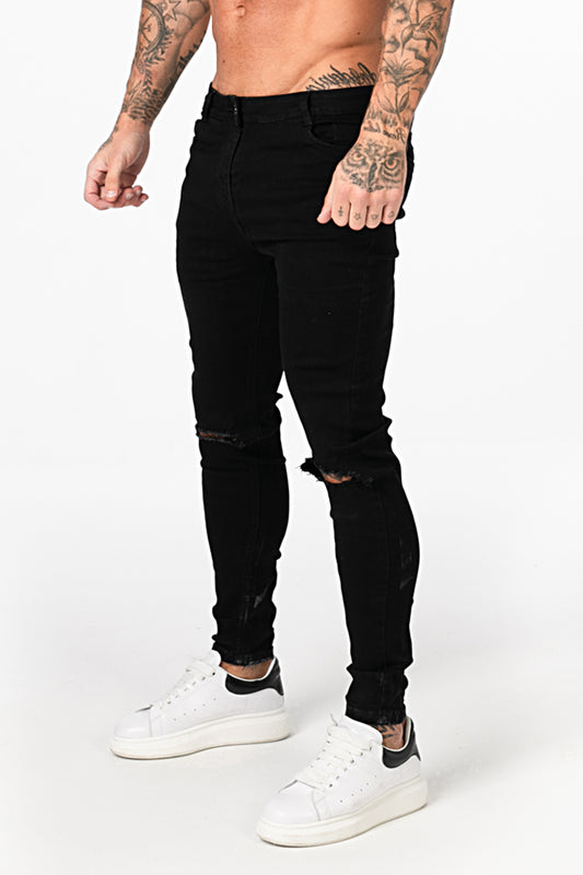 Black Ripped Jean On Knee