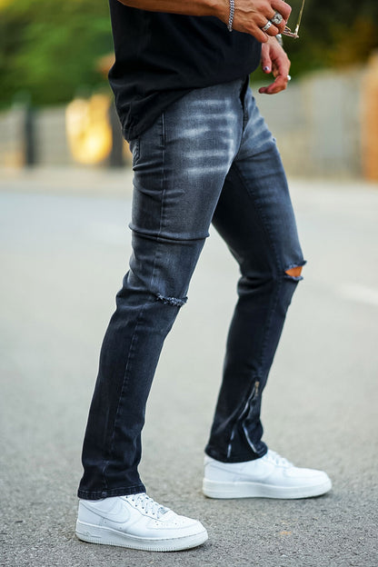 ripped knee black jeans