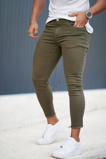 green skinny jeans