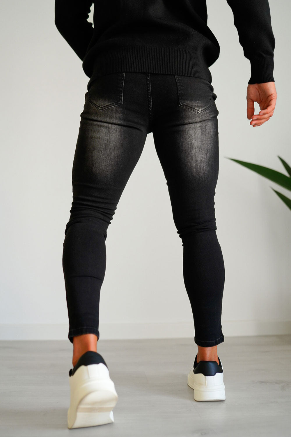 black ripped stretch jeans