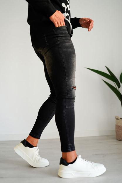 black ripped stretch jeans