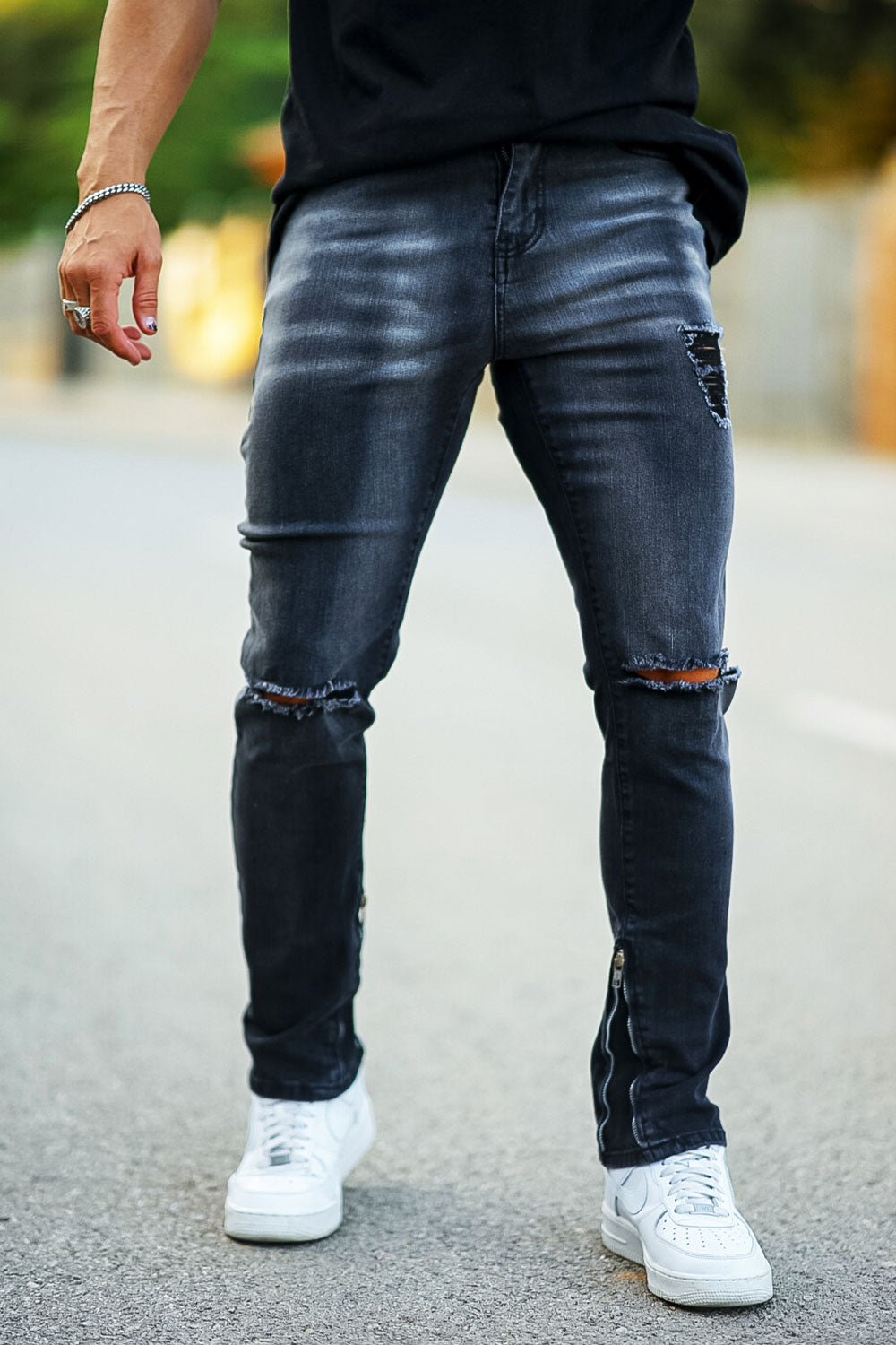 ripped knee black jeans