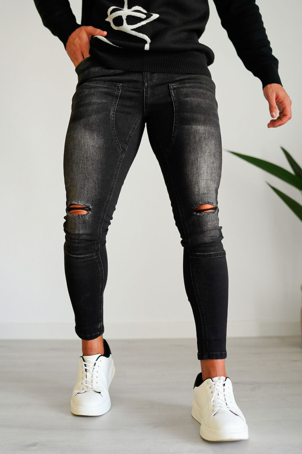 black ripped stretch jeans