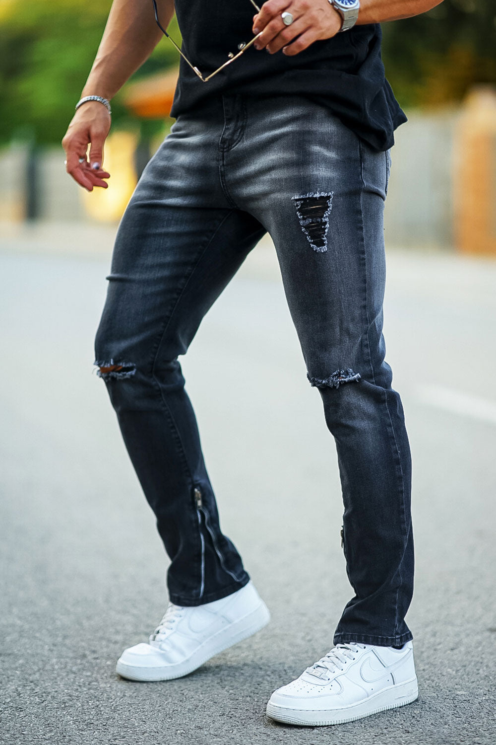 ripped knee black jeans