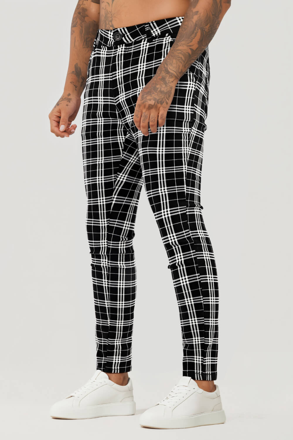 Pantaloni skinny scozzesi in bianco e nero da uomo