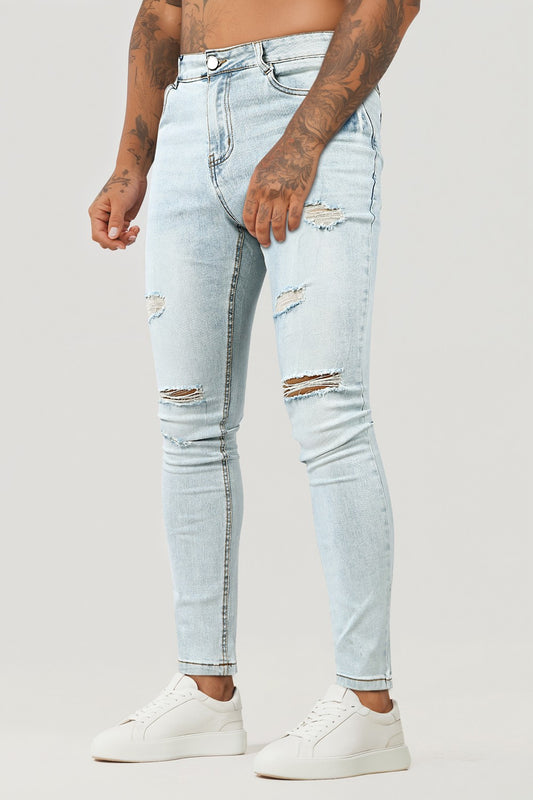 Ripped Knee Skinny Jean - Washed Blue